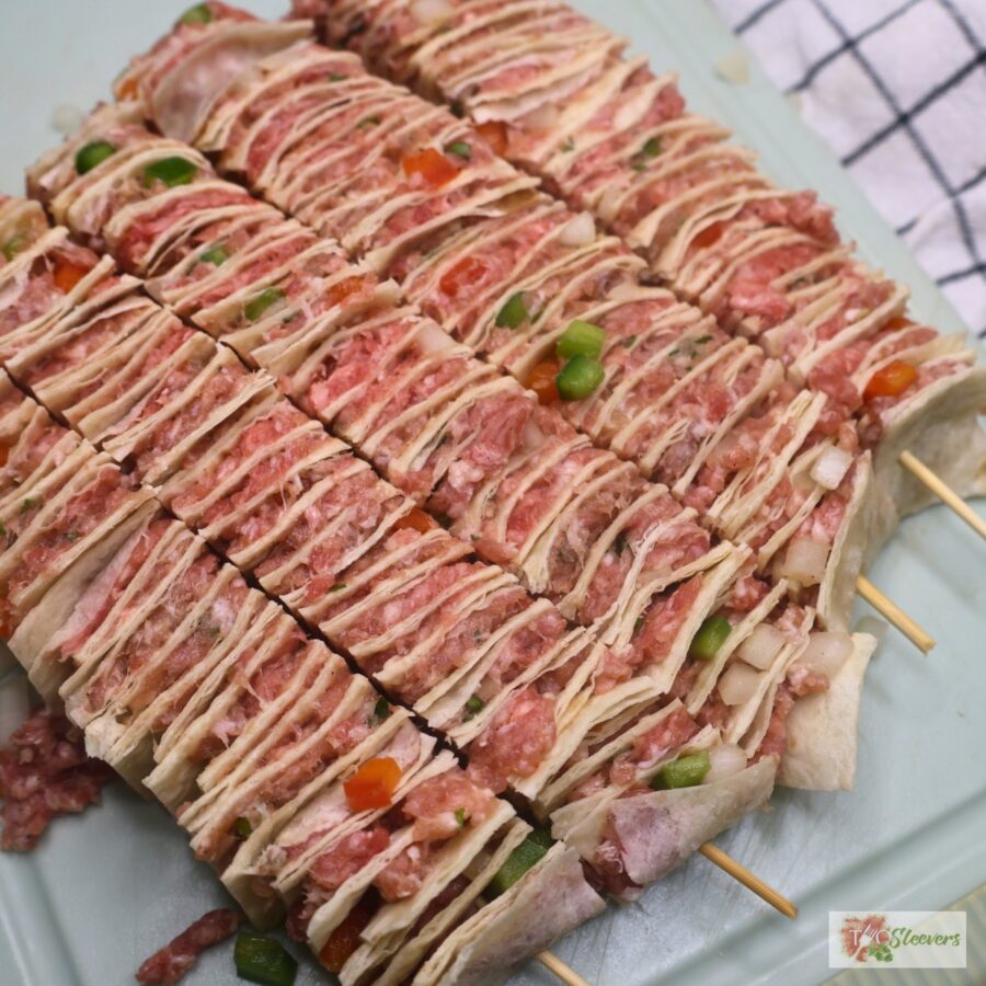 Skewered tortilla kebabs cut into five individual portions