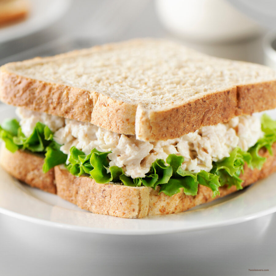 Tuna salad sandwich on a white plate