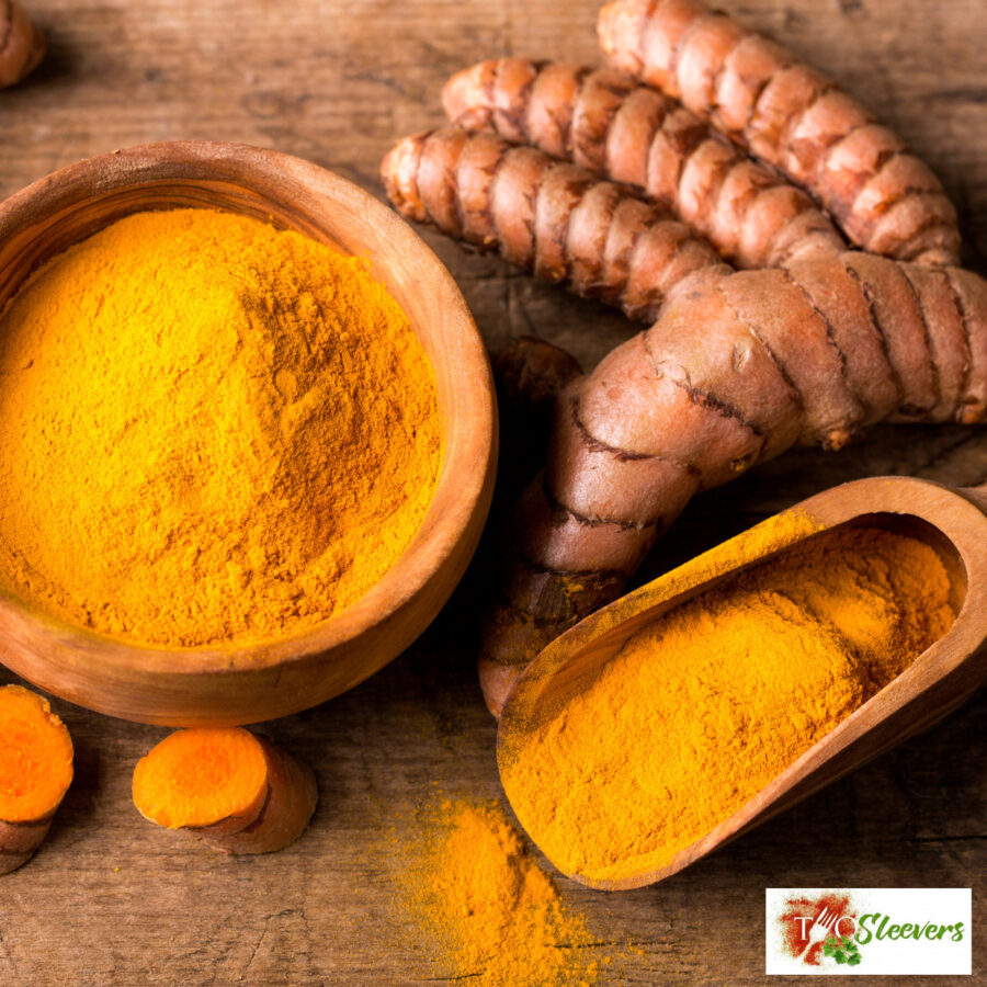 Turmeric in a wooden bowl and scoop