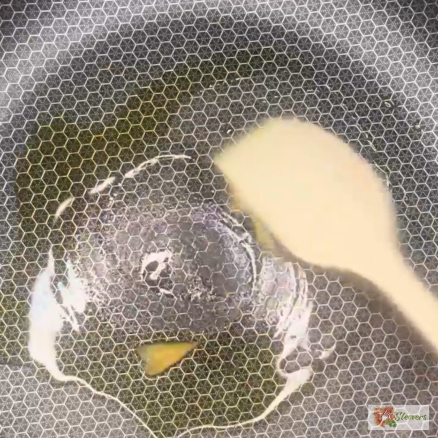 Garlic Paste cooking in a skillet with oil