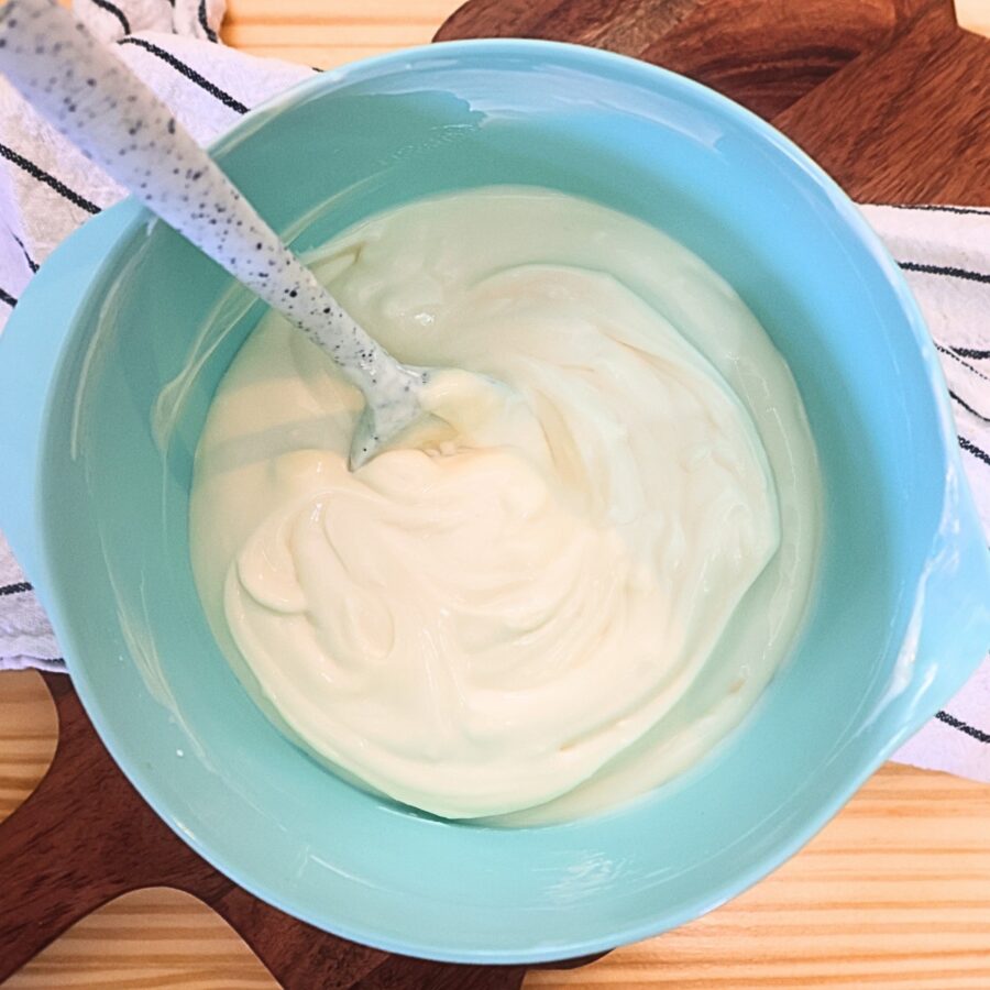 Overhead image of the base of the yogurt tiramisu in a blue bowl