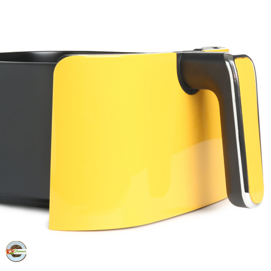 a yellow air fryer basket with a white background