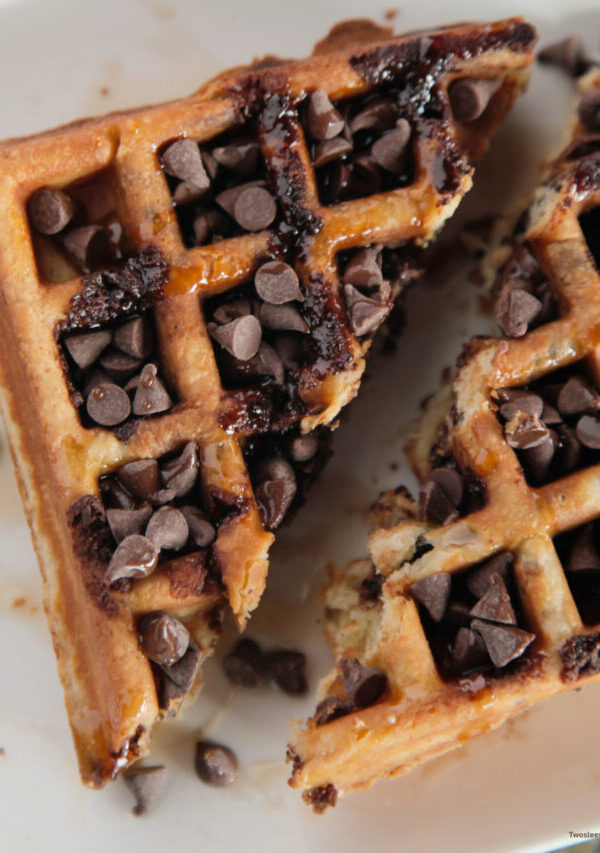 Overhead image of chocolate chip waffles cut in half