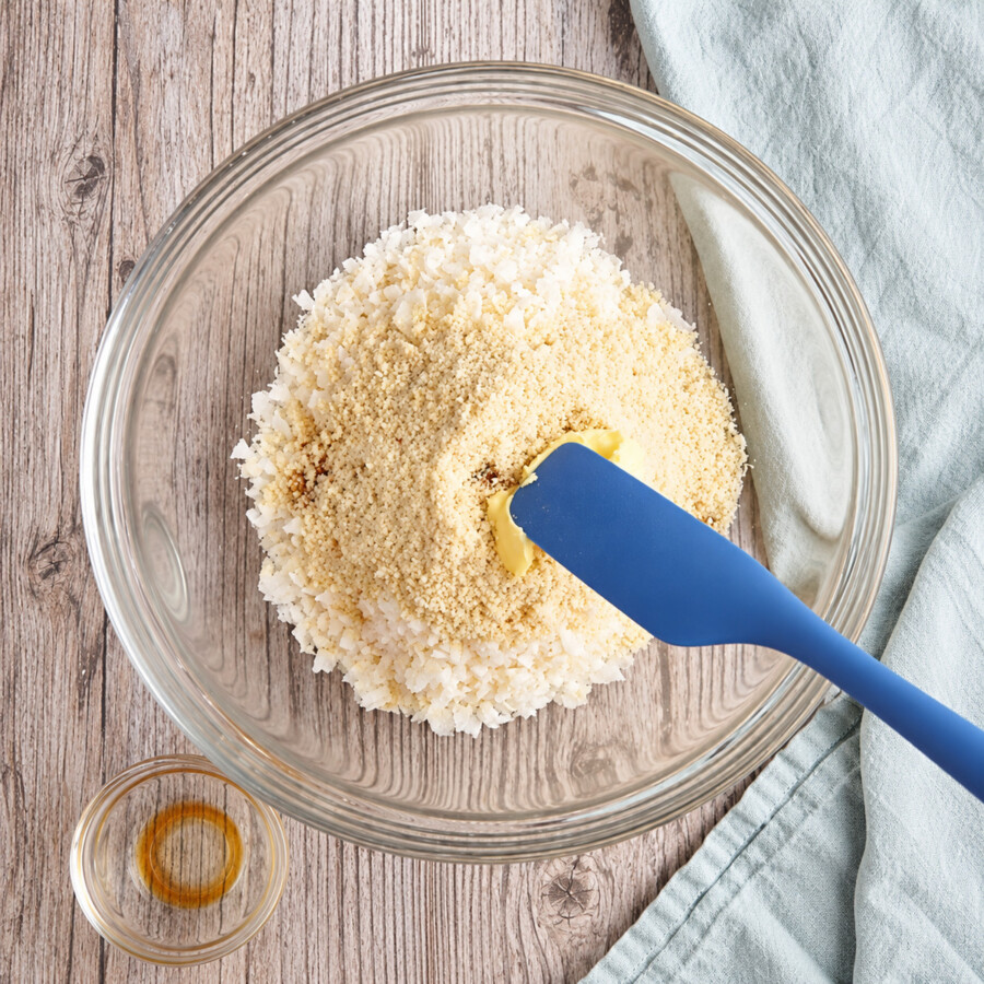 Ingredients for keto coconut macaroons in a glass bowl